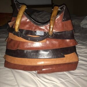 D and G layered leather bag wood handles